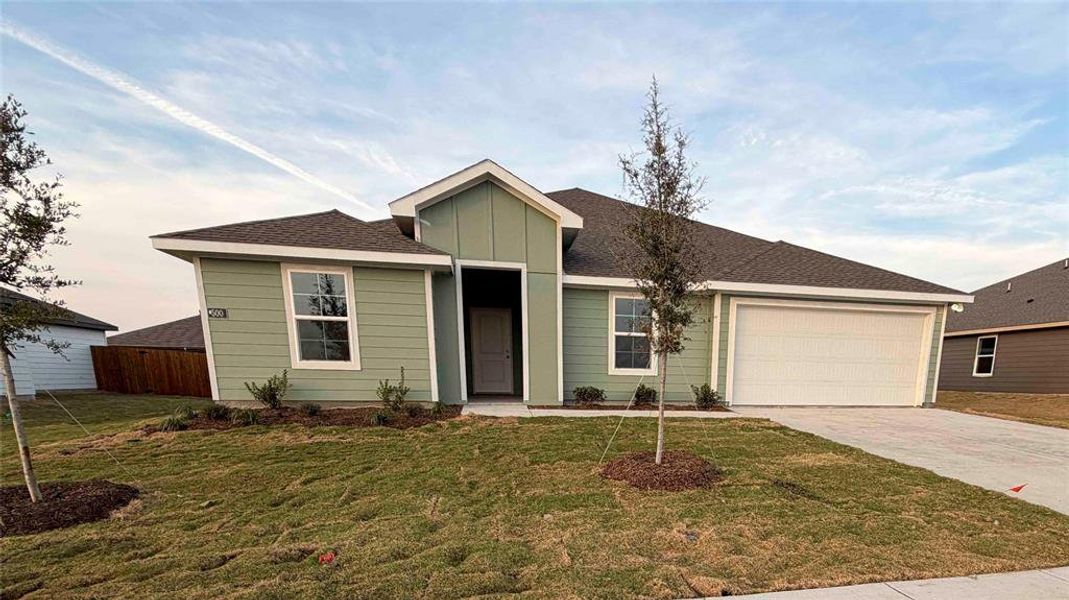 Front exterior of a new home in Waverly Estates, Josephine, TX, highlighting curb appeal (Image 8).