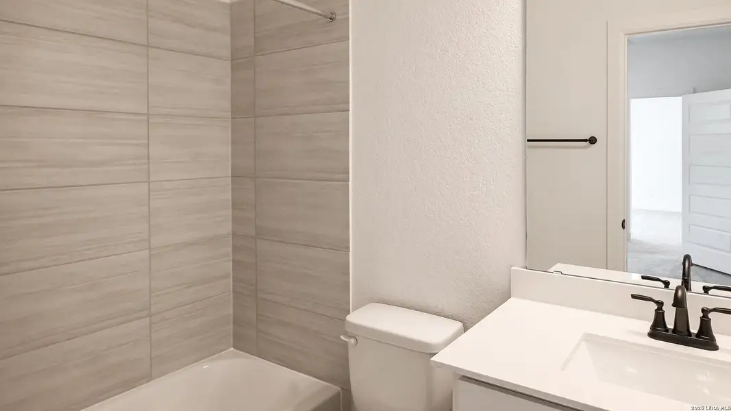 Furnished interior view inside a new home in Hidden Canyon, San Antonio (Image 10).