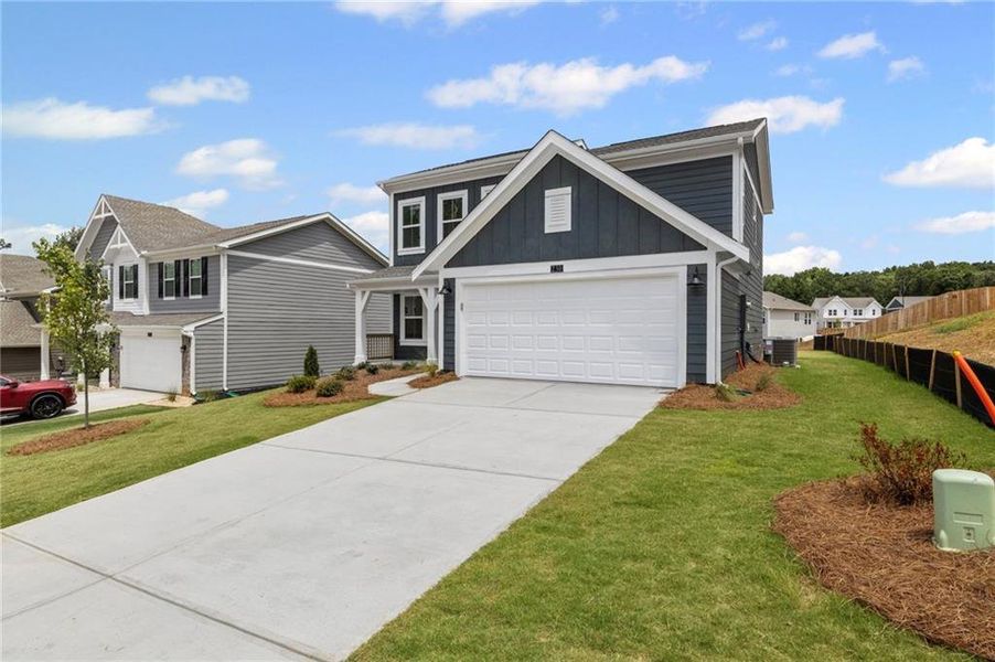 Front exterior of a new home in Sage Woods, Dallas, GA, highlighting curb appeal (Image 23).