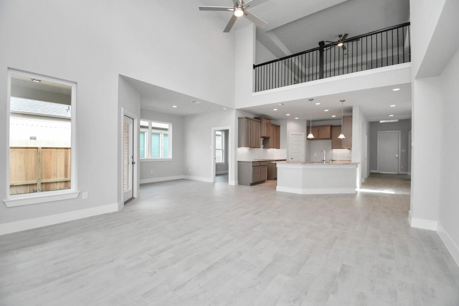 Take another glimpse into the heart of the home with this additional view of the family room—a sprawling space ready to accommodate all your gatherings. Sample photo of completed home with similar floor plan. Actual colors and selections may vary. Take another glimpse into the heart of the home with this additional view of the family room—a sprawling space ready to accommodate all your gatherings. Sample photo of completed home with similar floor plan. Actual colors and selections may vary.