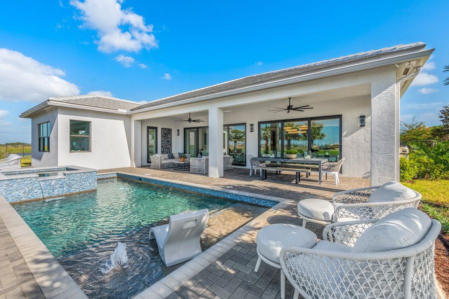 Exterior details and patio area of a home in Valencia Parc at Riverland, Port St. Lucie (Image 3).