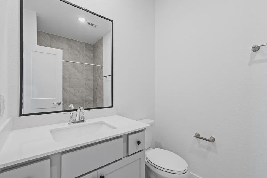 Furnished interior view inside a new home in Bridgeland Chateaus, Cypress (Image 9).