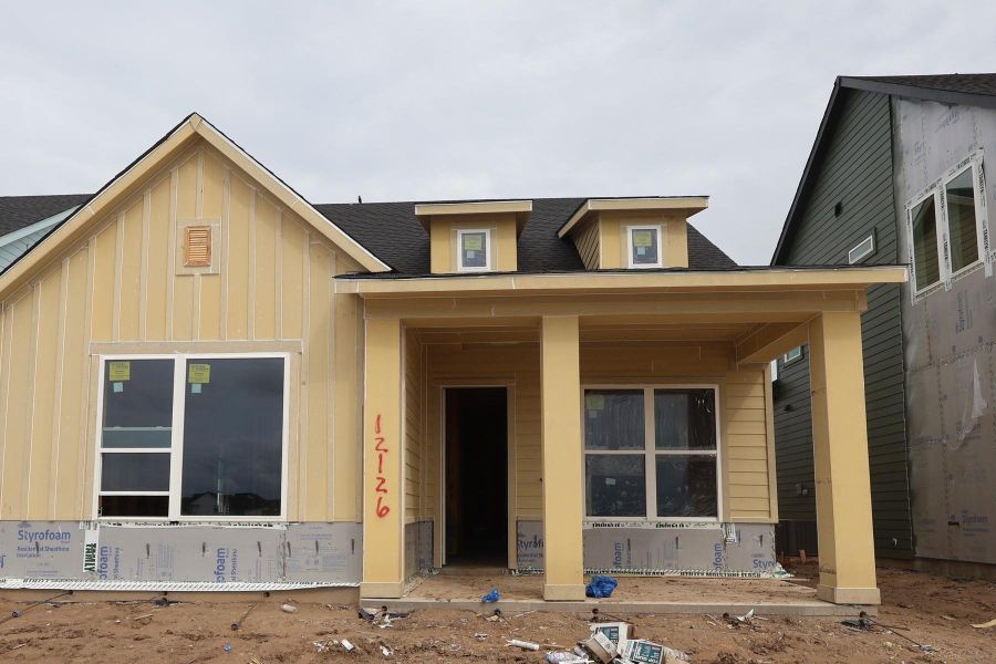 In-progress construction of a new home in Bridgeland Central: Emerald Heights - Landmark Row Collection, Cypress, TX (Image 13).