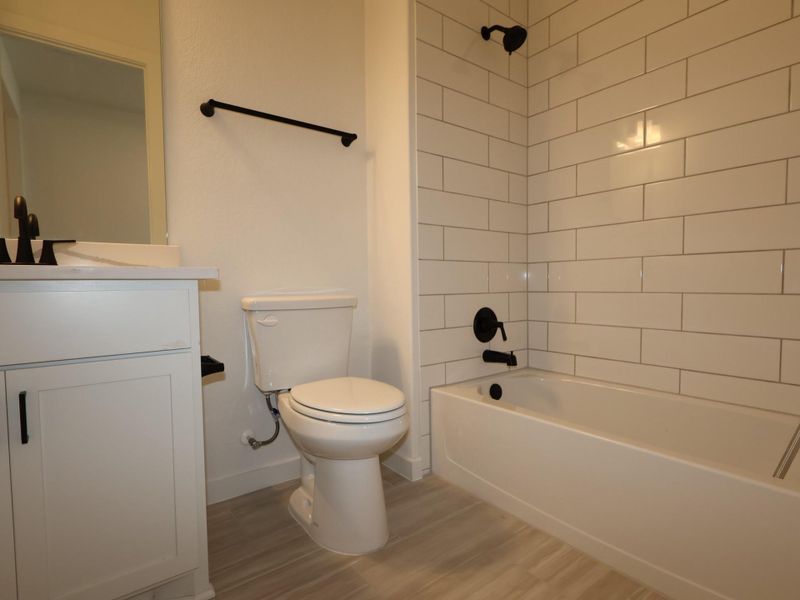 Furnished interior view inside a new home in Heritage, Dripping Springs (Image 5).