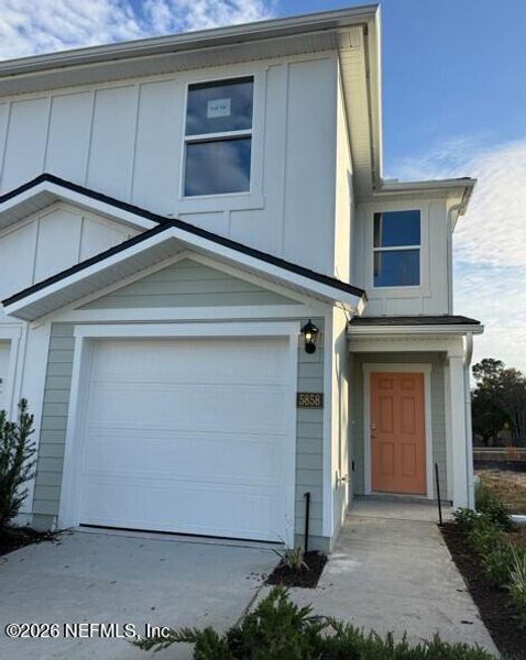 Front exterior of a new home in Trout River, Jacksonville, FL, highlighting curb appeal (Image 2).