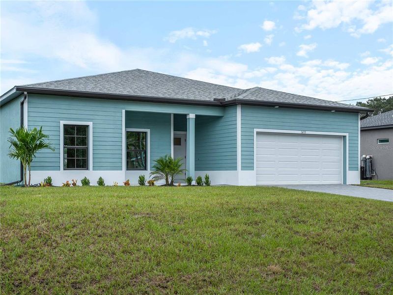 Exterior details and patio area of a home in , North Port (Image 26).