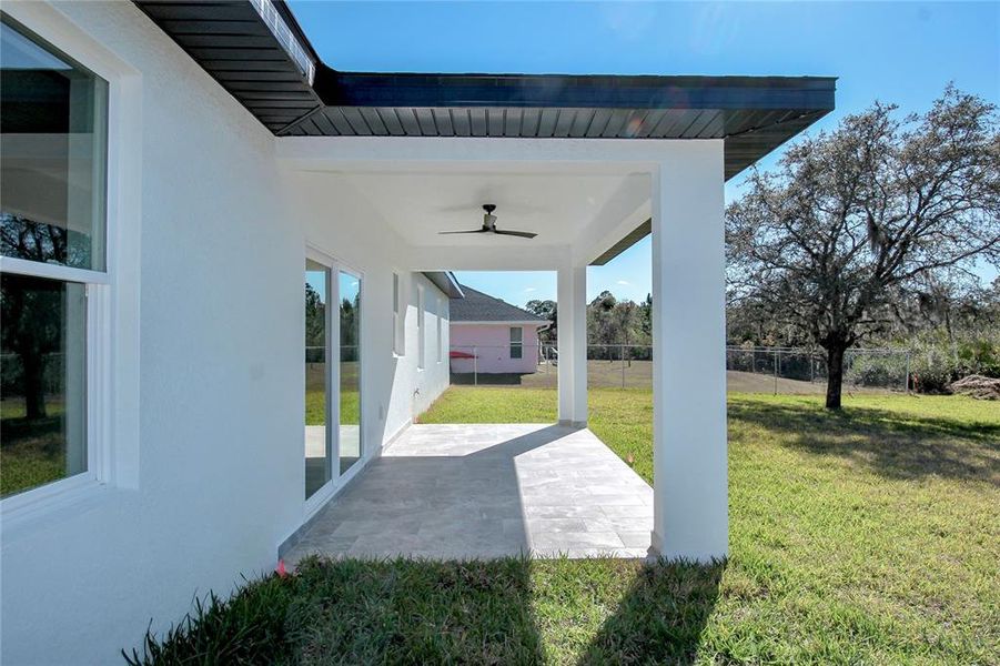 Exterior details and patio area of a home in , Sebring (Image 4).