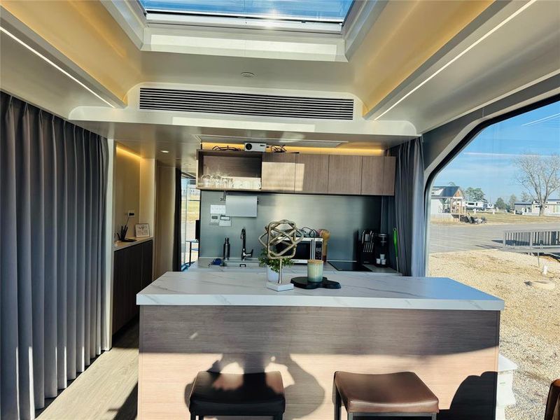 Bar featuring modern cabinets