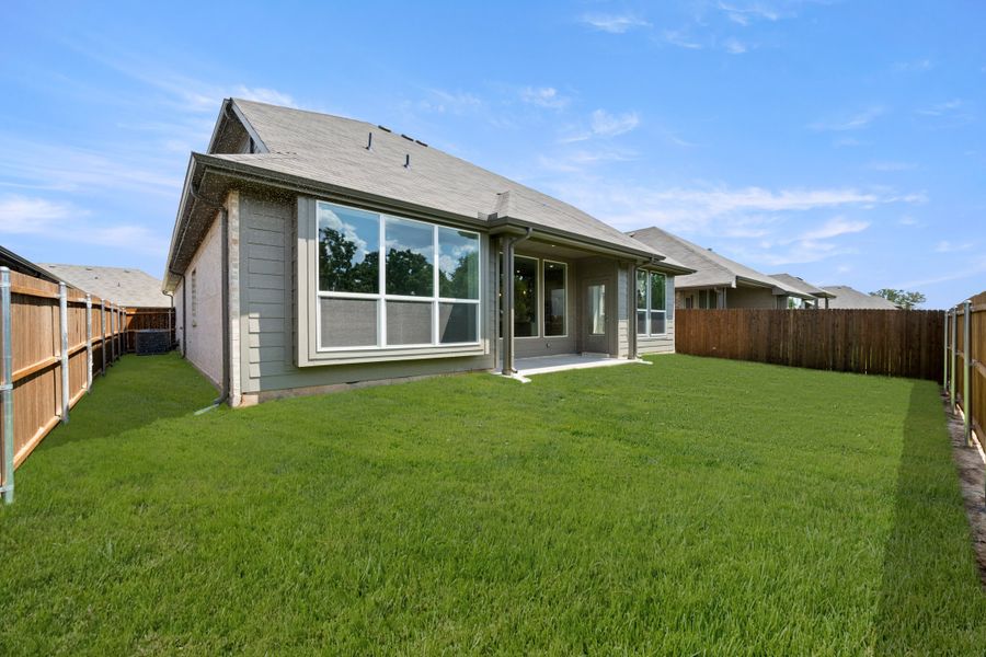 Exterior details and patio area of a home in Pirate Village, Granbury (Image 18).