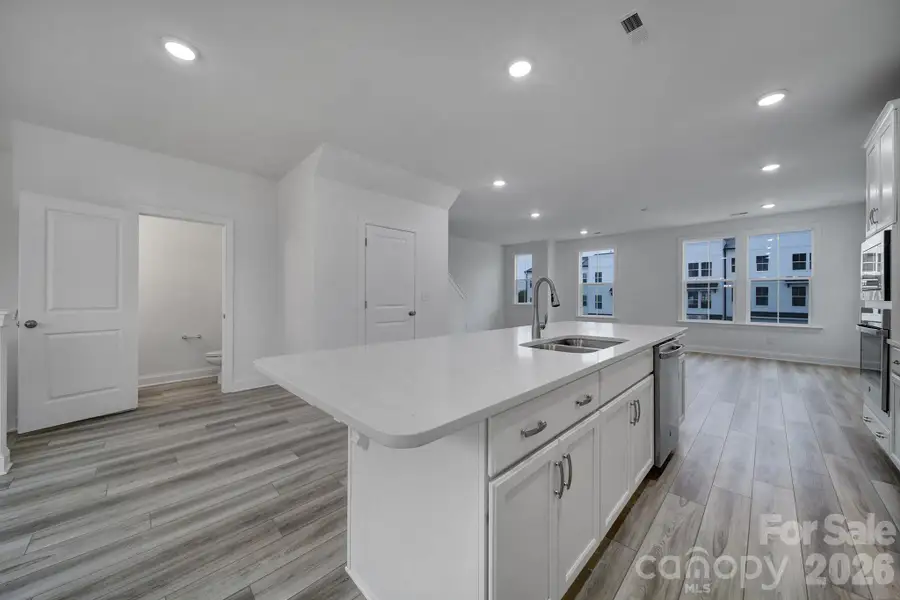 Furnished interior view inside a new home in , Concord (Image 6).