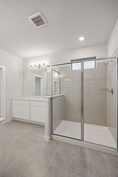 Primary Bathroom in the Wimbledon home plan by Trophy Signature Homes – REPRESENTATIVE PHOTO Primary Bathroom in the Wimbledon home plan by Trophy Signature Homes – REPRESENTATIVE PHOTO