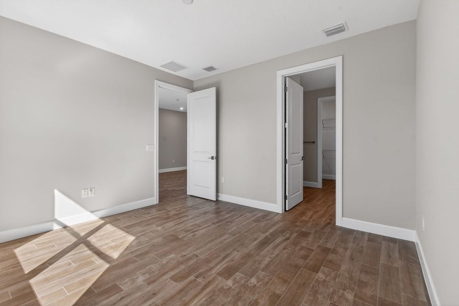 Spacious, unfurnished interior of a new home in Costa Pointe, Vero Beach (Image 57).