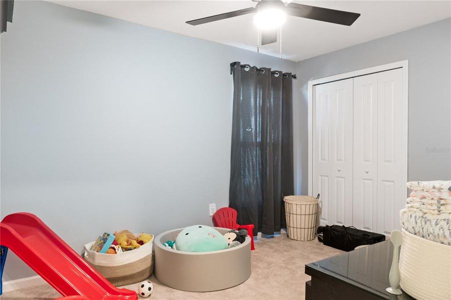 Furnished interior view inside a new home in Peace Creek Reserve: Grand Collection, Winter Haven (Image 9).