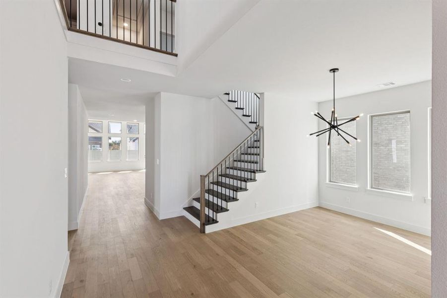 Welcome into your new dream home featuring site lines from the front to the rear of the home and a spacious light filled dining room perfect for holiday parties!