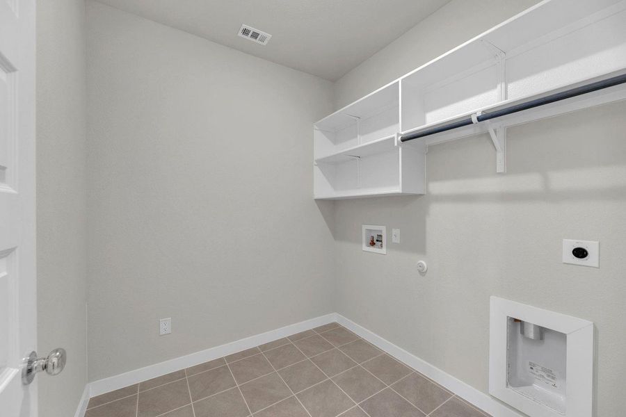 Utility Room in the Pecos home plan by Trophy Signature Homes – REPRESENTATIVE PHOTO