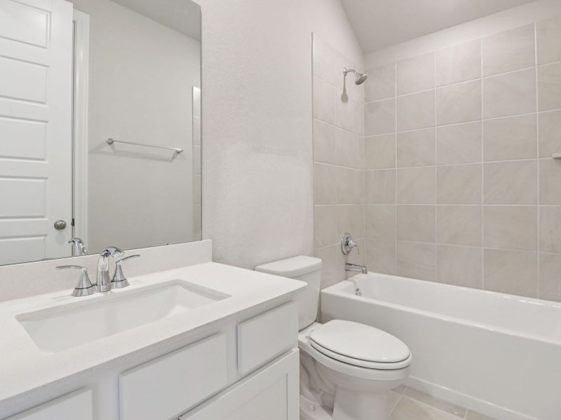 Furnished interior view inside a new home in Sanford Farms - Classic Series, Waller (Image 5). Furnished interior view inside a new home in Sanford Farms - Classic Series, Waller (Image 5).