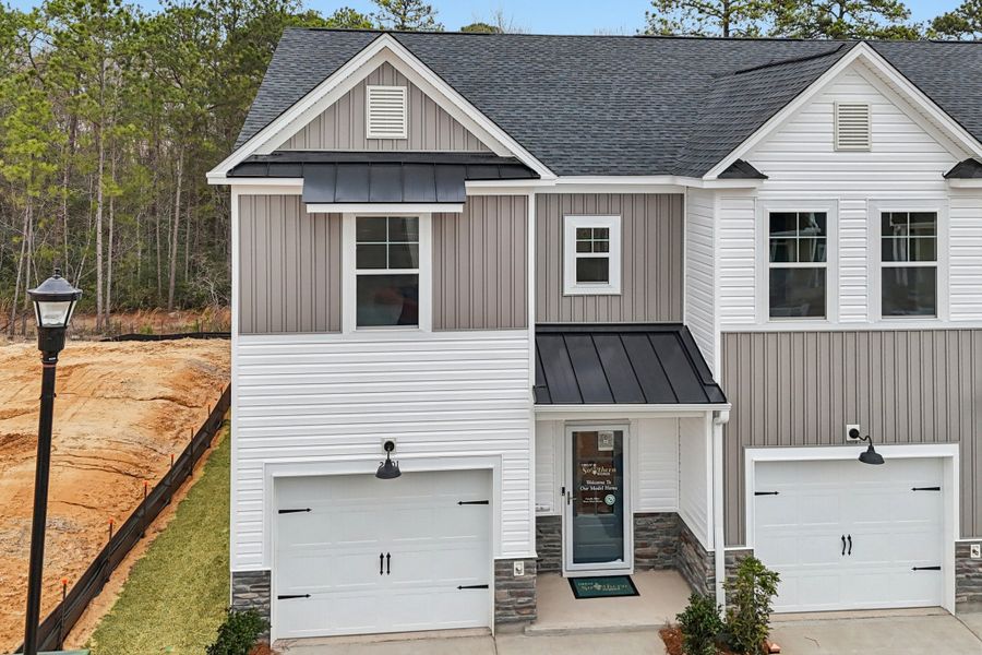 Representative exterior details of a home built from the East Wind by Great Southern Homes in Victory Woods, Columbia (Image 3). Representative exterior details of a home built from the East Wind by Great Southern Homes in Victory Woods, Columbia (Image 3).