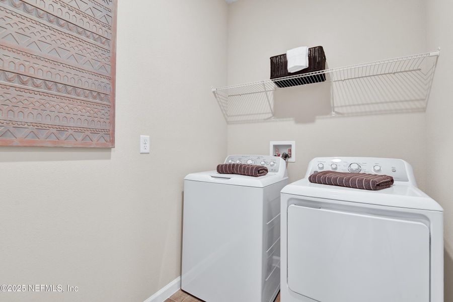 Furnished interior view inside a new home in Seasons at Grandview Gardens, Deland (Image 17).
