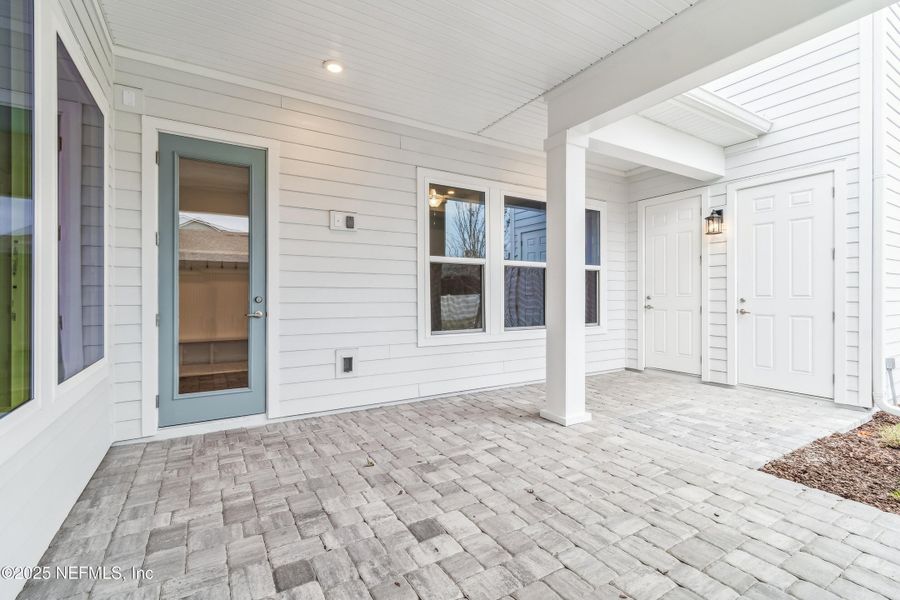 Exterior details and patio area of a home in Seabrook Village 50’ Rear Entry, Nocatee (Image 3).