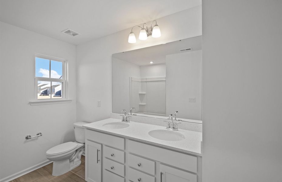 Furnished interior view inside a new home in Parkside Crossing, Charlotte (Image 7). Furnished interior view inside a new home in Parkside Crossing, Charlotte (Image 7).