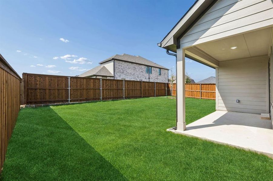 Patio in the Oscar home plan by Trophy Signature Homes – REPRESENTATIVE PHOTO Patio in the Oscar home plan by Trophy Signature Homes – REPRESENTATIVE PHOTO