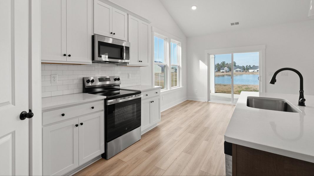 Furnished interior view inside a new home in Chestnut Farms, Longs (Image 6).