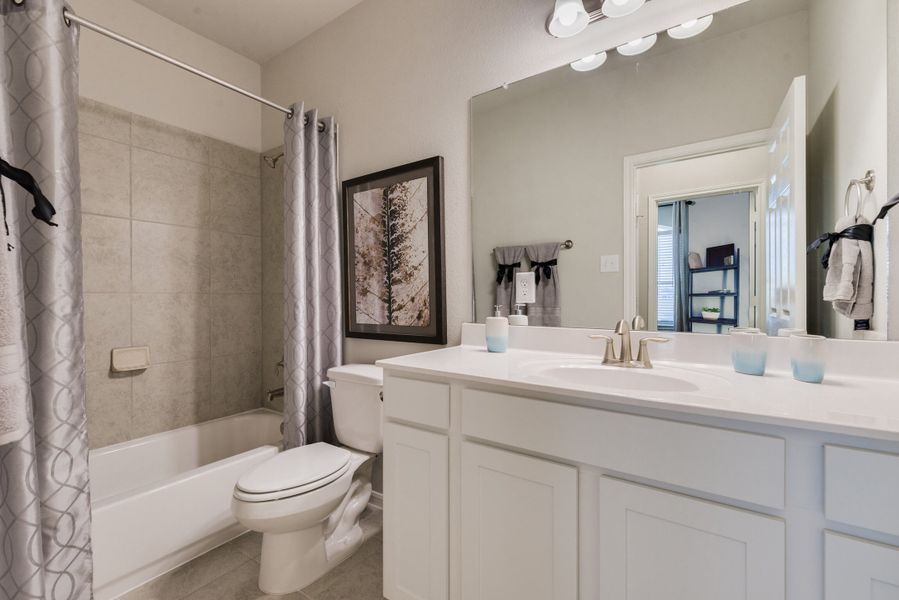 Representative furnished interior of a home built from the Floor Plan 1759 by Colina Homes in Grand Magnolia, Magnolia (Image 40). Representative furnished interior of a home built from the Floor Plan 1759 by Colina Homes in Grand Magnolia, Magnolia (Image 40).