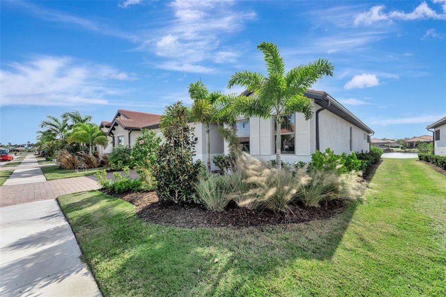 Front exterior of a new home in , Nokomis, FL, highlighting curb appeal (Image 2).