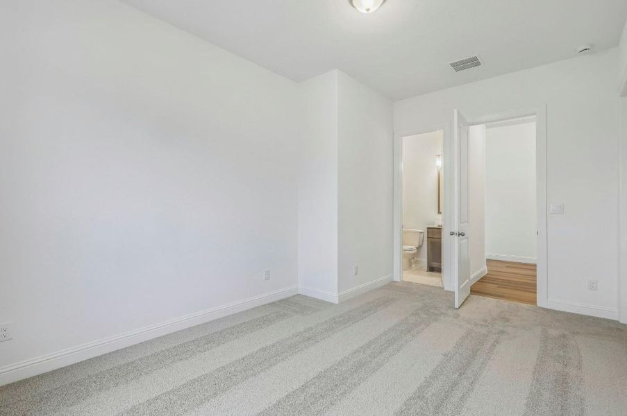 Spacious, unfurnished interior of a new home in The Grand Prairie 60', Hockley (Image 11).