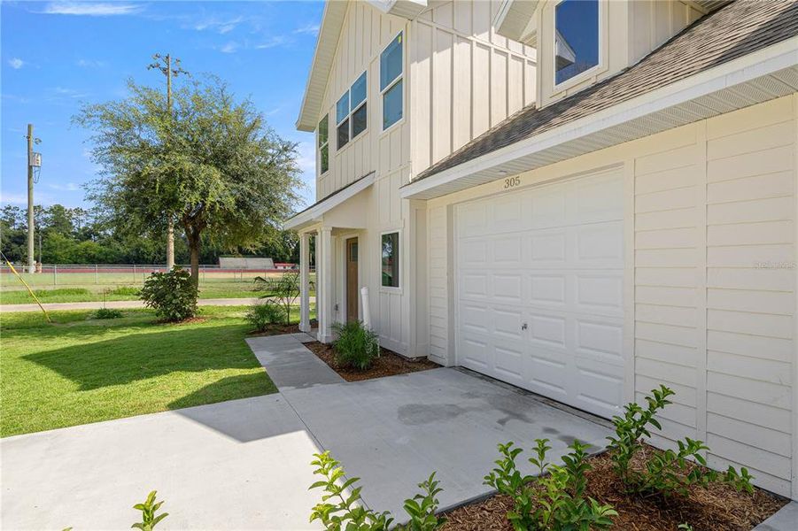Front exterior of a new home in , Williston, FL, highlighting curb appeal (Image 18).