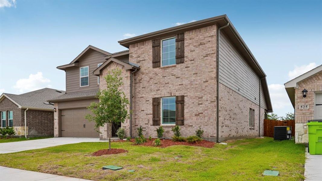 Front exterior of a new home in Frontier Pointe, Princeton, TX, highlighting curb appeal (Image 21).