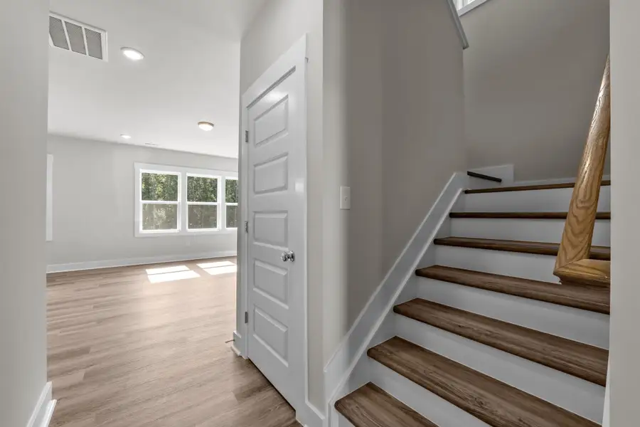 Representative unfurnished interior of a home built from the Happy by Garman Homes in Golden Gate, High Point (Image 15).