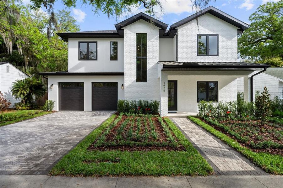 Front exterior of a new home in College Park, Orlando, FL, highlighting curb appeal (Image 26).
