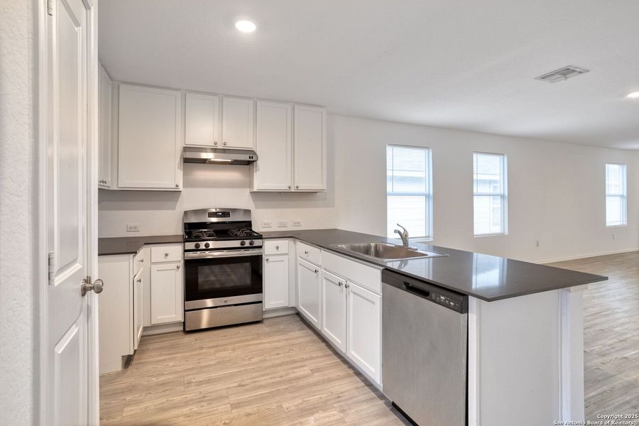 Furnished interior view inside a new home in Ruby Crossing: Cottage Collection, San Antonio (Image 7).