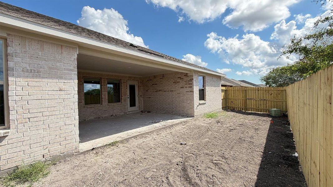 Exterior details and patio area of a home in The Lakes Northwest, Corpus Christi (Image 21).