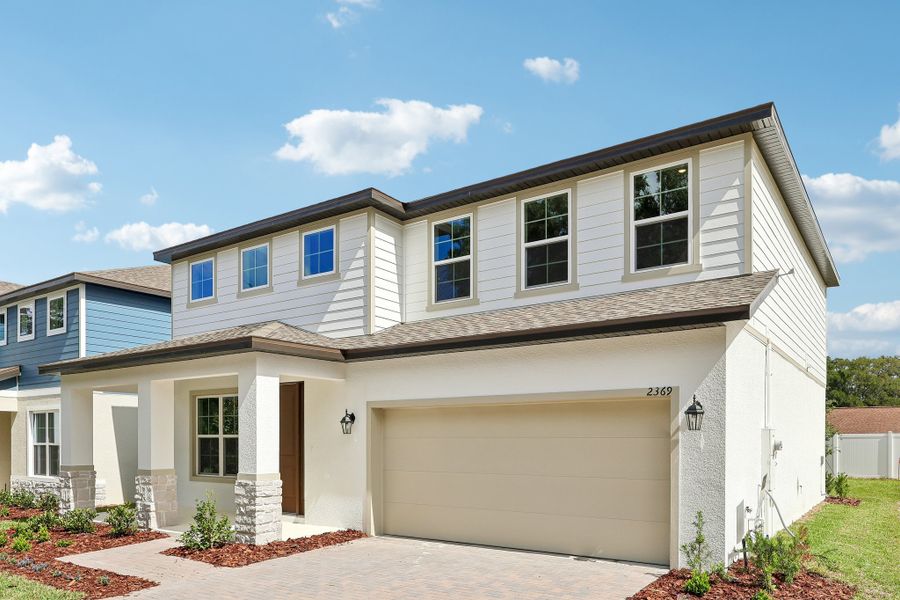 Representative exterior photo of a completed home built from the Florence by Hartizen Homes in Estes Reserve, Eustis, FL (Image 35). Representative exterior photo of a completed home built from the Florence by Hartizen Homes in Estes Reserve, Eustis, FL (Image 35).