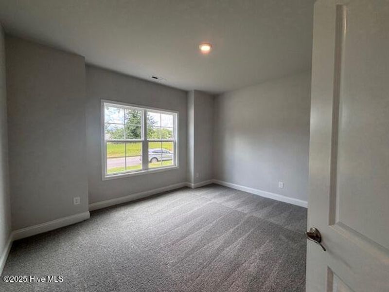 Spacious, unfurnished interior of a new home in River Village Square in River Landing, Wallace (Image 10).