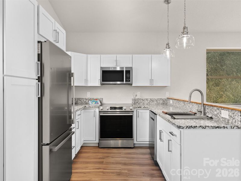 Furnished interior view inside a new home in , Waynesville (Image 8).