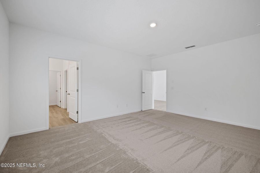 Spacious, unfurnished interior of a new home in TrailMark, St. Augustine (Image 32).