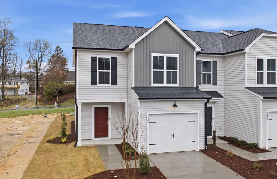 Front exterior of a new home in Flemingfield, Greensboro, NC, highlighting curb appeal (Image 31).