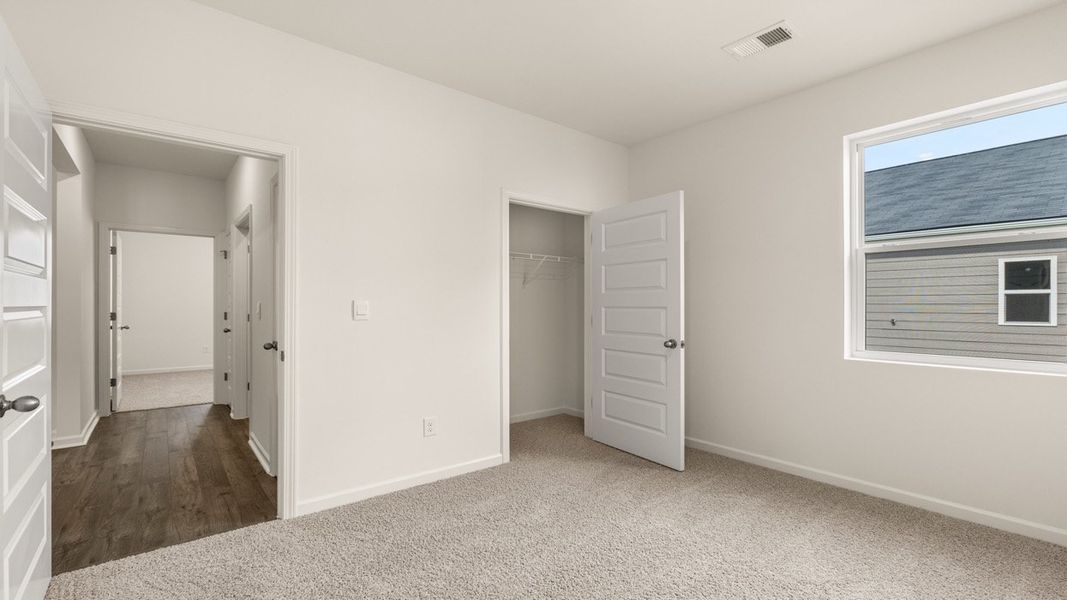 Representative unfurnished interior of a home built from the Macon by D.R. Horton in Poplar Preserve, Newnan (Image 18).