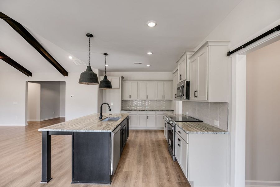 Furnished interior view inside a new home in LOVVORN ESTATES, Carrollton (Image 7).