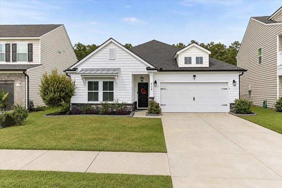 Front exterior of a new home in , Moncks Corner, SC, highlighting curb appeal (Image 24). Front exterior of a new home in , Moncks Corner, SC, highlighting curb appeal (Image 24).
