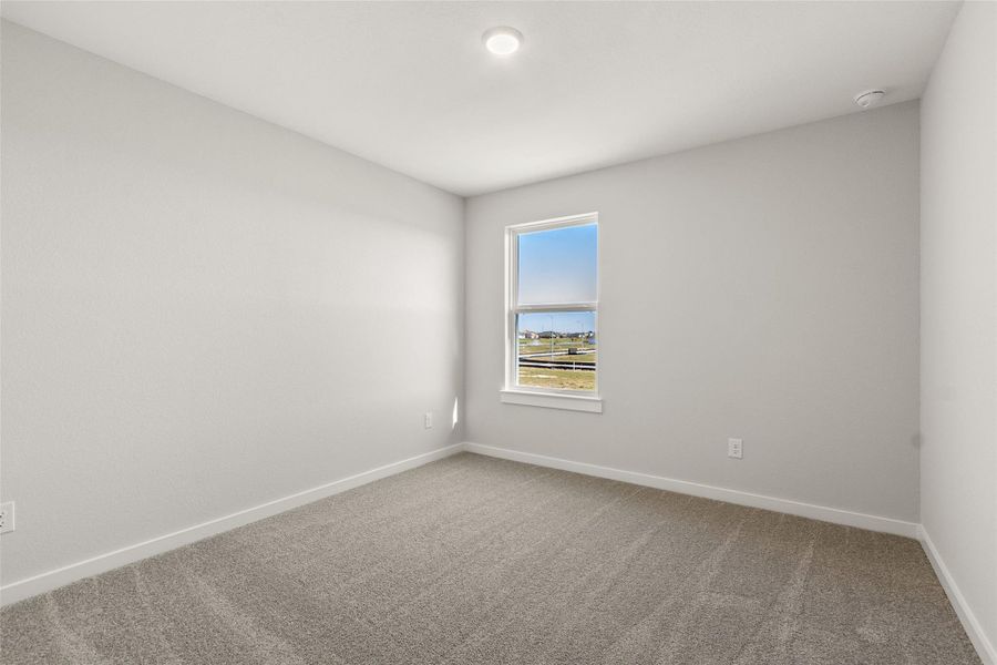 Spacious, unfurnished interior of a new home in Sunterra, Katy (Image 35).