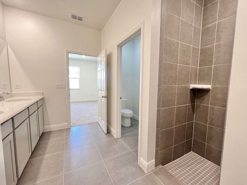 Furnished interior view inside a new home in Lakes At St Sebastian, Micco (Image 11).