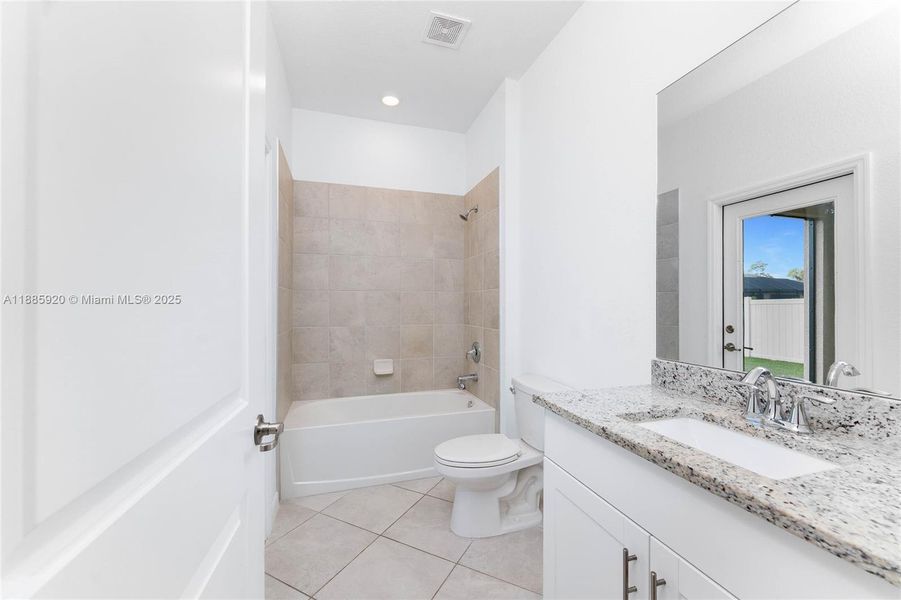 Furnished interior view inside a new home in , Port Charlotte (Image 10).