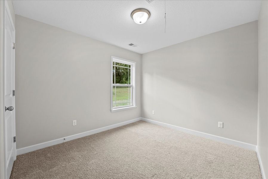 Representative unfurnished interior of a home built from the Lyman by Enchanted Homes in Lonesome Dove, San Antonio (Image 24).