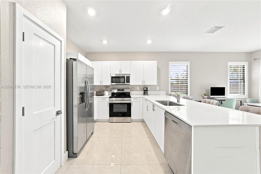 Furnished interior view inside a new home in , Miami (Image 12). Furnished interior view inside a new home in , Miami (Image 12).