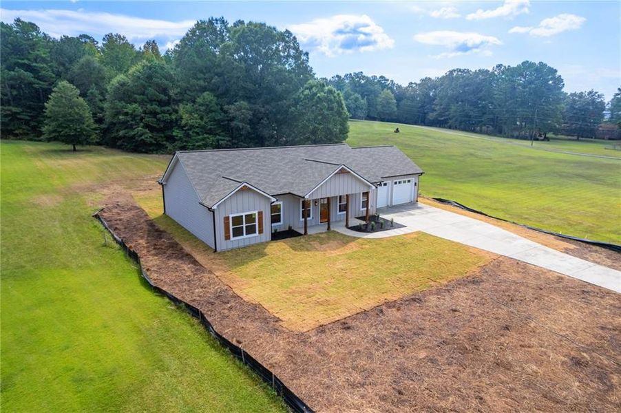 Front exterior of a new home in , Cedartown, GA, highlighting curb appeal (Image 24).