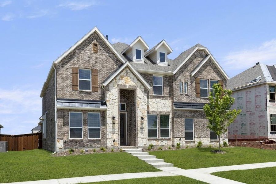 Front exterior of a new home in Villages of Creekwood, Frisco, TX, highlighting curb appeal (Image 13). Front exterior of a new home in Villages of Creekwood, Frisco, TX, highlighting curb appeal (Image 13).